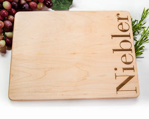 I am delighted to share my new acquisition - the Gava Shops maple cutting board featuring a bold engraving of our last name. It adds a touch of elegance to our kitchen!