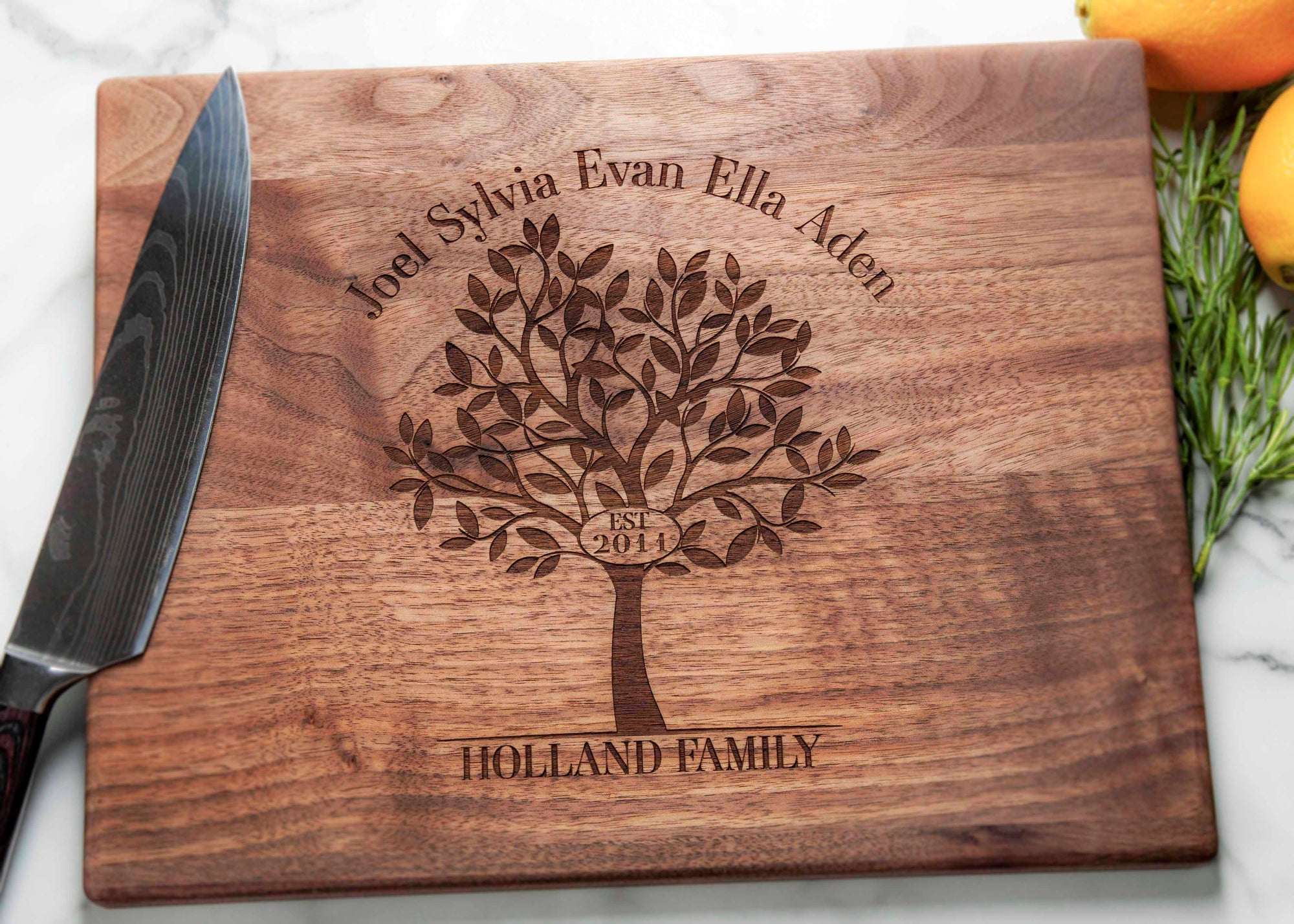 A symbol of togetherness and love, surprise your family or loved one with this unique personalized cutting board. With its beautiful family name tree motif, it makes the perfect gift for any special occasion like weddings, anniversaries, and housewarmings. Show them just how special they are with this thoughtful and practical gift!