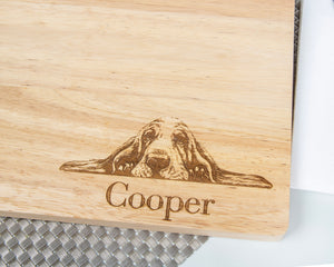This personalized Basset Hound Cutting Board makes a perfect gift for any dog lover! Crafted from beautiful bamboo and engraved with a special French Bulldog design, this cutting board is the perfect gift for any household. With a handy juice groove and grooved handle, this cutting board is both stylish and practical—perfect for holidays, birthdays, and housewarming gifts for both him and her.