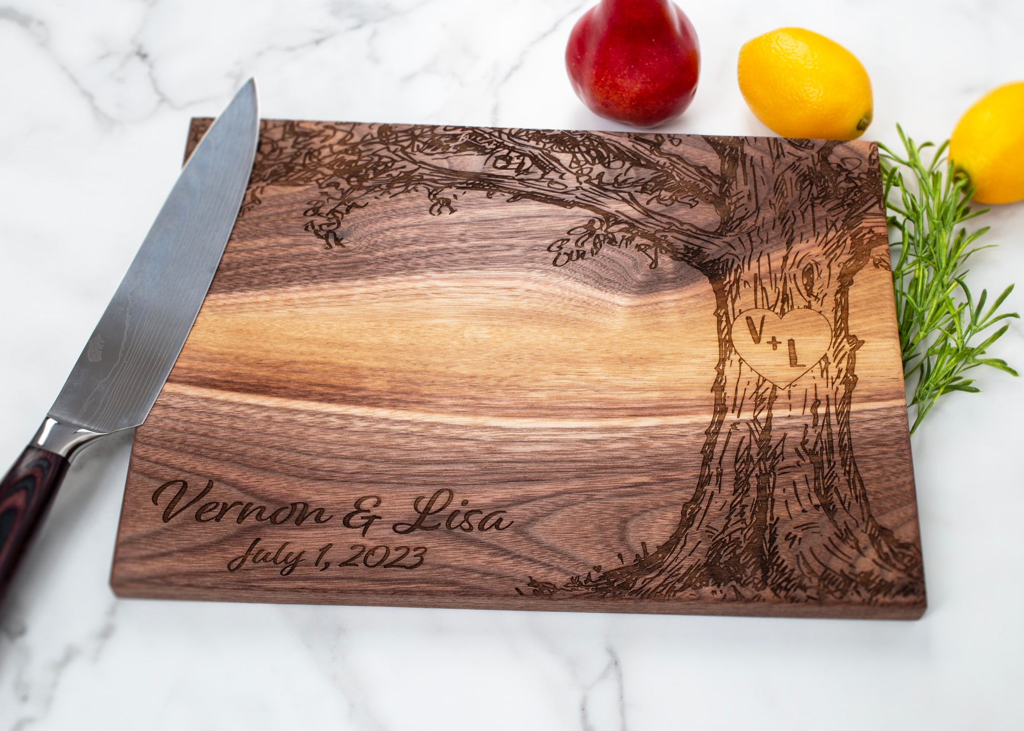 MADE IN THE USA A Beautiful Personalized Laser Engraved Cutting Board with your choice of wood type and size. Each board is designed and hand-crafted in house from start to finish by carefully selecting each piece of raw lumber followed by using top of the line machinery. FREE SHIPPING