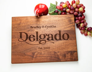The ideal gift for any special occasion, this personalized cutting board is crafted from quality wood and features a scripted last name along the side. Its unique design makes it a perennially popular wedding, anniversary, and housewarming present. Impress the recipient with this exclusive, one-of-a-kind kitchen accessory.
