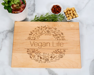 Bring joy to your kitchen with the Vegan Life Design personalized cutting board! Crafted from sustainable bamboo, this sturdy and stylish cutting board is perfect for any occasion.