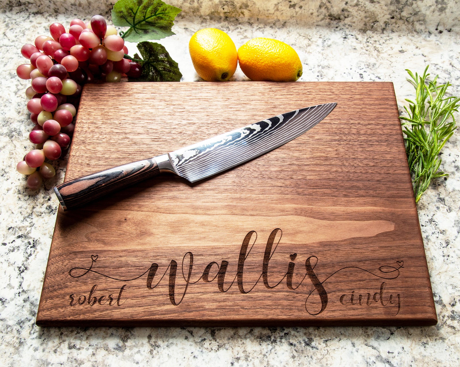 Make your special events more memorable with this Scripted Last Name with Heart glyphs Cutting Board. It is the perfect gift for weddings, anniversaries, housewarmings, and more. This cutting board is made with durable materials and is designed to last. Show your love and appreciation with this thoughtful gift.