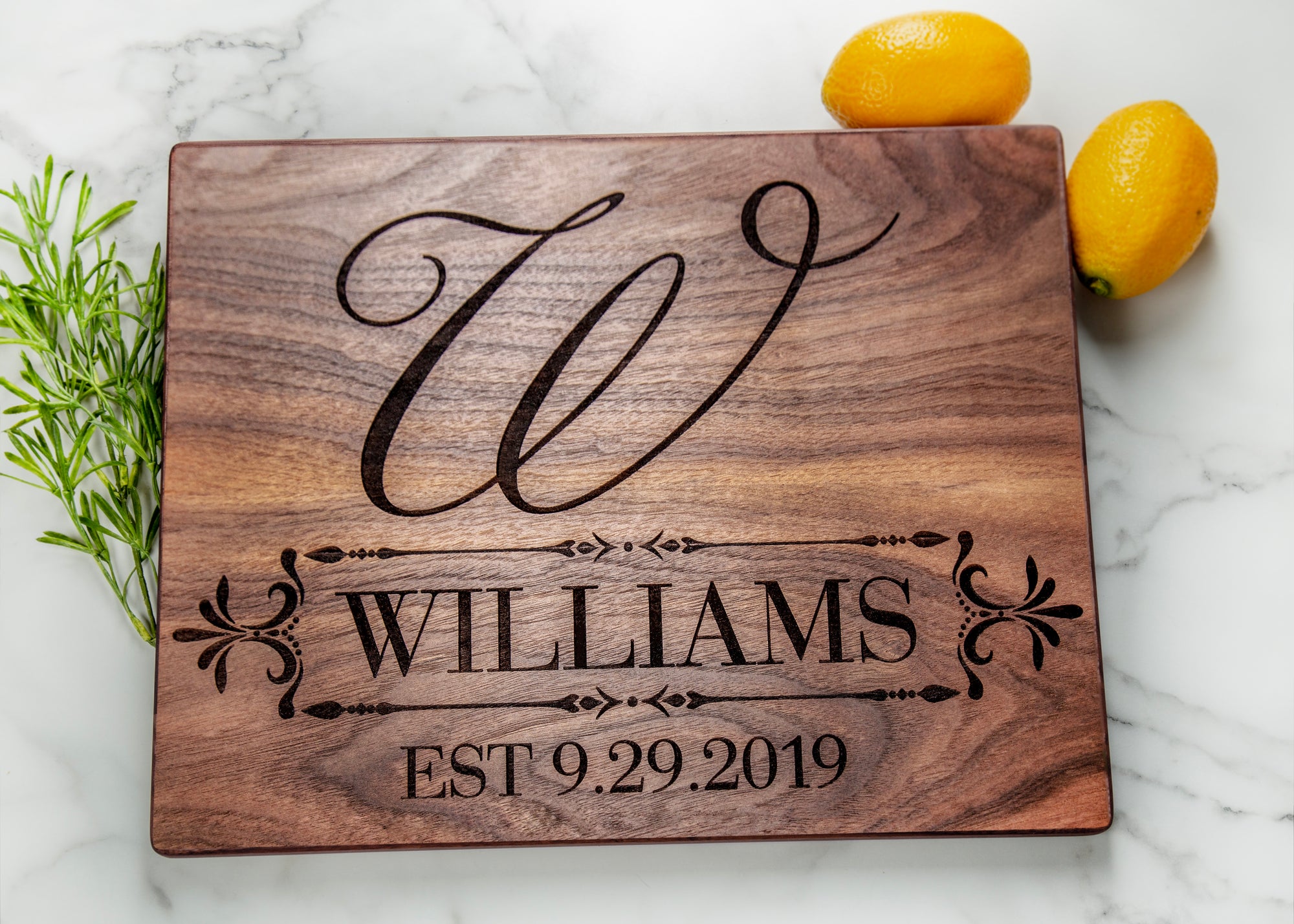 Express your everlasting love with this swoon-worthy personalized cutting board! With an impactful large initial, last name, and date it’s the perfect way to commemorate special occasions--from weddings to anniversaries and beyond. Composed of durable wood, this timeless gift is sure to be treasured for years to come. Make your special someone’s day with this stunning custom cutting board.