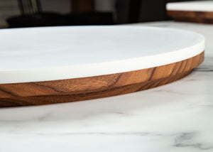 Our Black Walnut & Corian Charcuterie Board is the perfect gift for any occasion. The beautiful pairing of black walnut and Corian creates something truly special: an eye-catching, highly durable charcuterie board that will stand out as the centerpiece of any occasion. Impress your friends with this unique and stylish board - perfect for any event!