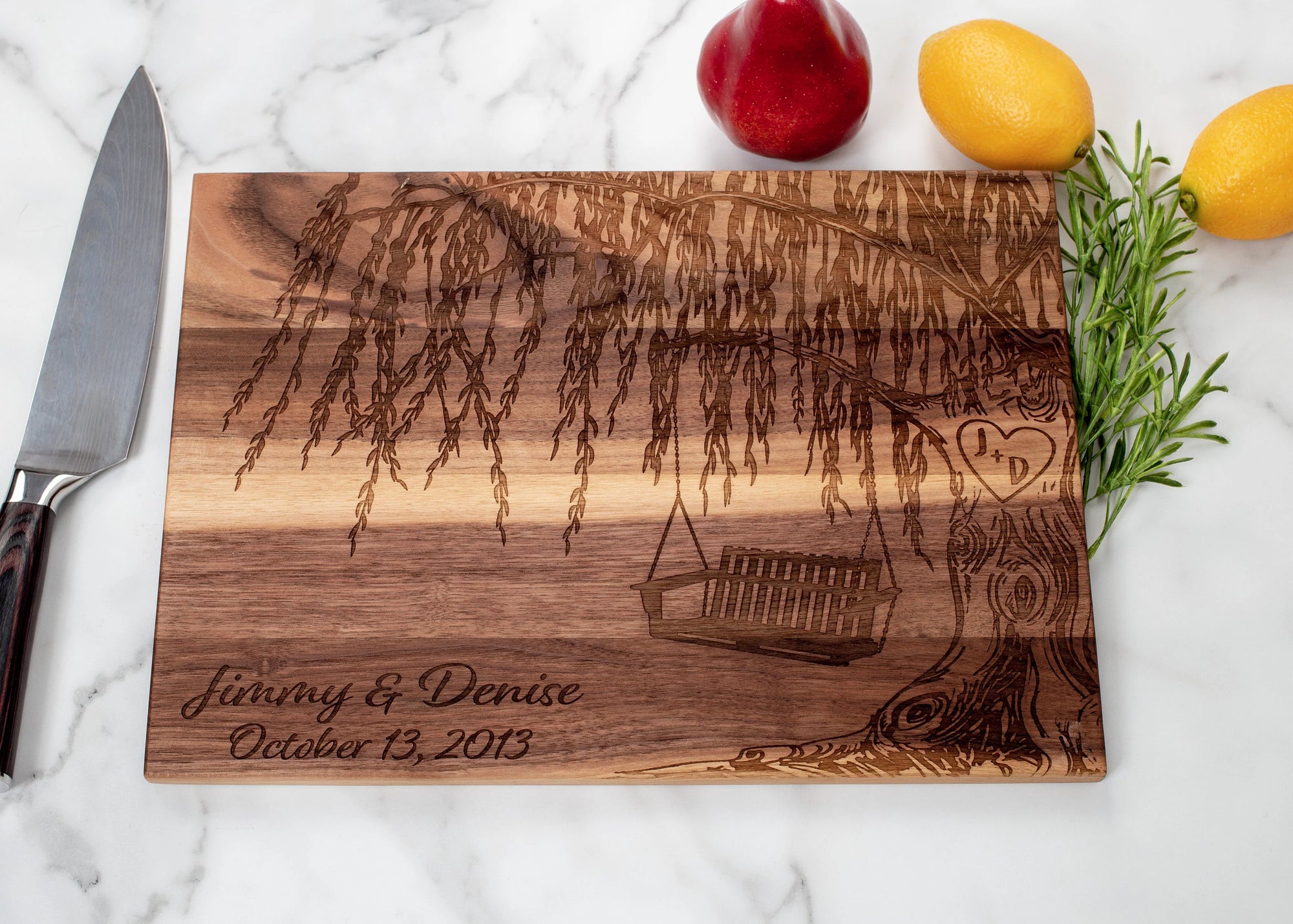 An impeccable selection for your 9th anniversary, this personalized cutting board with an exquisite Willow Tree design is both a work of art and an enduring token of love. Crafted with care from enduring hardwood, this gifted keepsake will remain a cherished reminder of your thoughtfulness and appreciation for years to come, making it a perfect housewarming, wedding, or anniversary gift.