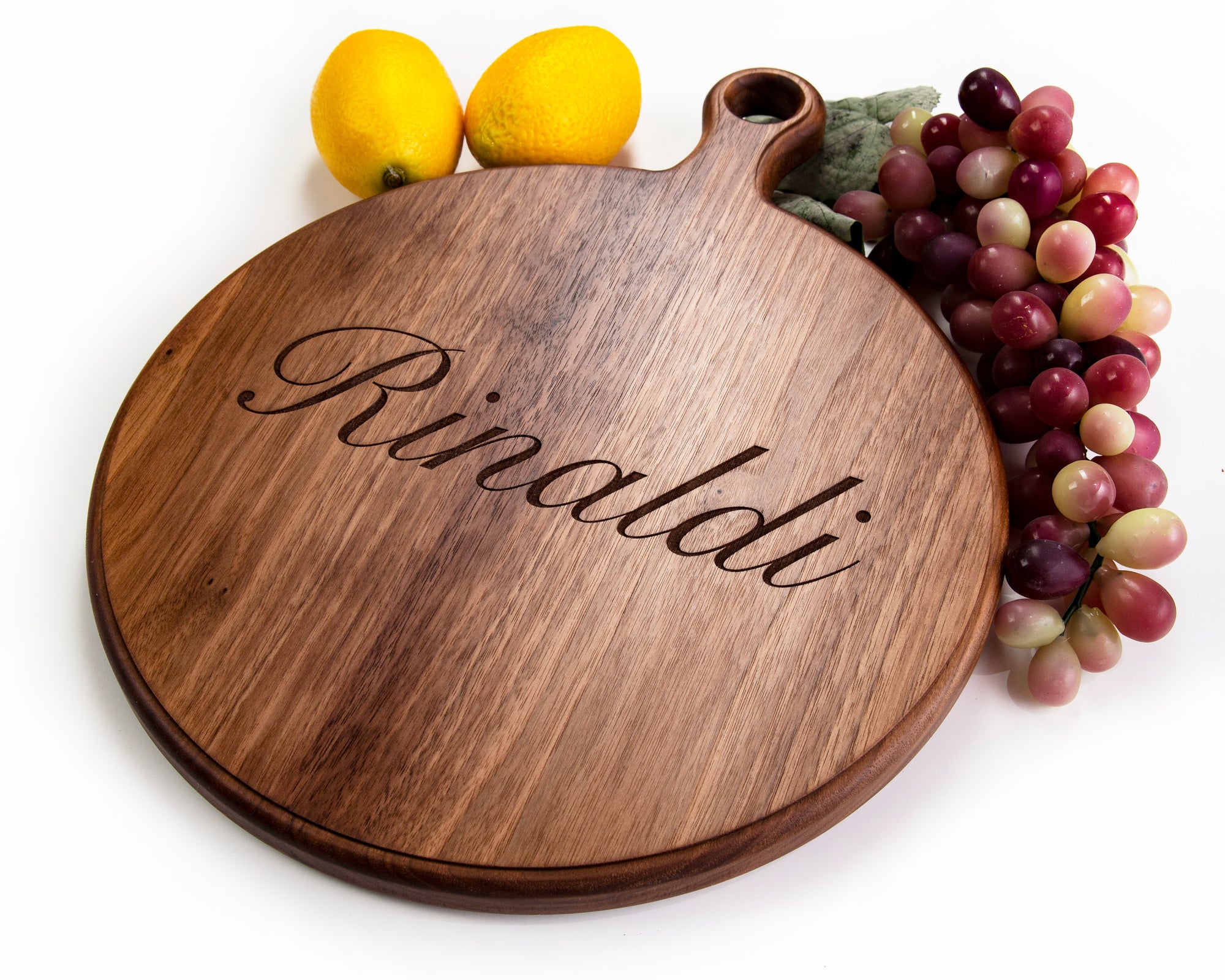 This Round Personalized Charcuterie Board is the perfect gift for any occasion. Crafted from quality wood, its timeless design guarantees long-lasting performance. A leather hanging strap adds an elegant touch, while a personalized engraving makes it an extra special gift. Suitable for a housewarming, wedding, or any other celebration, this charcuterie board is the perfect way to show your appreciation.