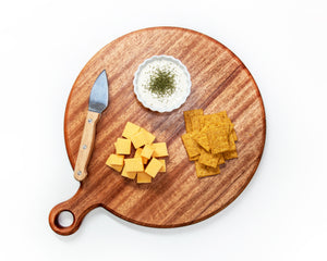 This Round Personalized Charcuterie Board is the perfect gift for any occasion. Crafted from quality wood, its timeless design guarantees long-lasting performance. A leather hanging strap adds an elegant touch, while a personalized engraving makes it an extra special gift. Suitable for a housewarming, wedding, or any other celebration, this charcuterie board is the perfect way to show your appreciation.